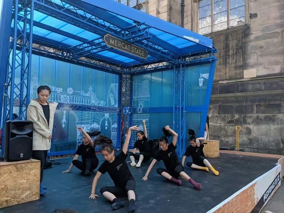 Dancers performing on the Mercat Stage on the Royal Mile, Edinburgh