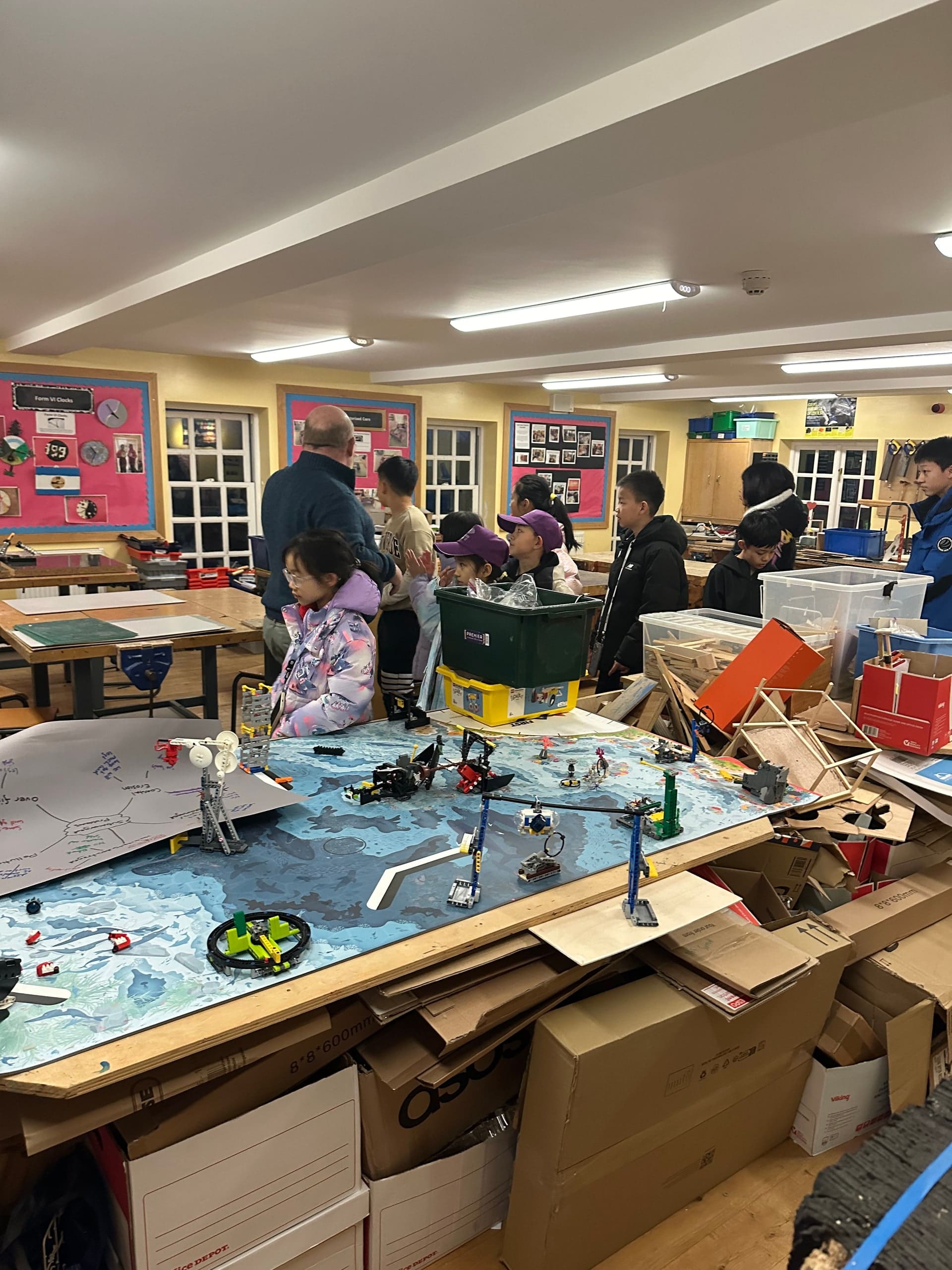 Half-built robots and engineering models in a design and technology workshop